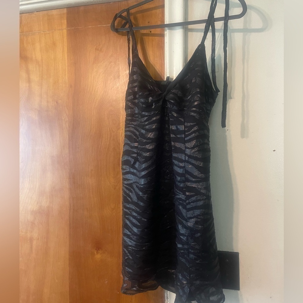 White fable black Zebra print mini dress size medium  zipper back